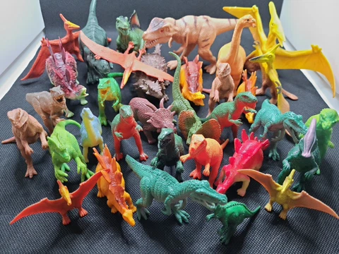 Large Lot Of Vintage Dinosaur Toys Cover