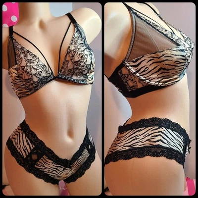 Victoria's Secret Conjunto de sujetador/braguita de encaje satinado sedoso muy sexy talla 32F/animal mediano Foto 1 de 4