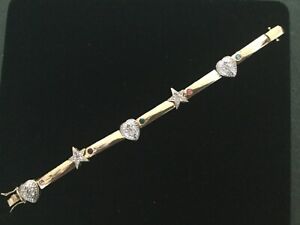 7 1/2" YELLOW GOLD LINK BRACELET WITH GENUINE DIAMOND CLUSTERS   21.6g   # 277