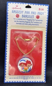 Pulsera Hallmark Raggedy Ann & Andy 1974 vintage con dije de plástico nueva sellada - Imagen 1 de 2