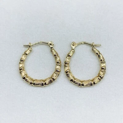 Aretes tipo argolla redondos de eslabones de concha con corte de diamante de oro amarillo de 14k de 17 mm  Foto 1 de 4