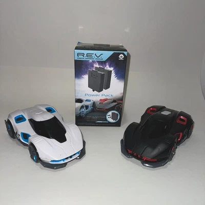 R.E.V. Vehículos Robóticos Mejorados y Power Pack - Batalla 2 coches + Manual por WowWee Foto 1 de 4