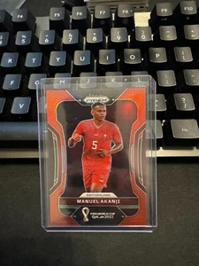 2022 Panini Prizm World Cup Prizms Red #266 Manuel Akanji /399 - Picture 1 of 2