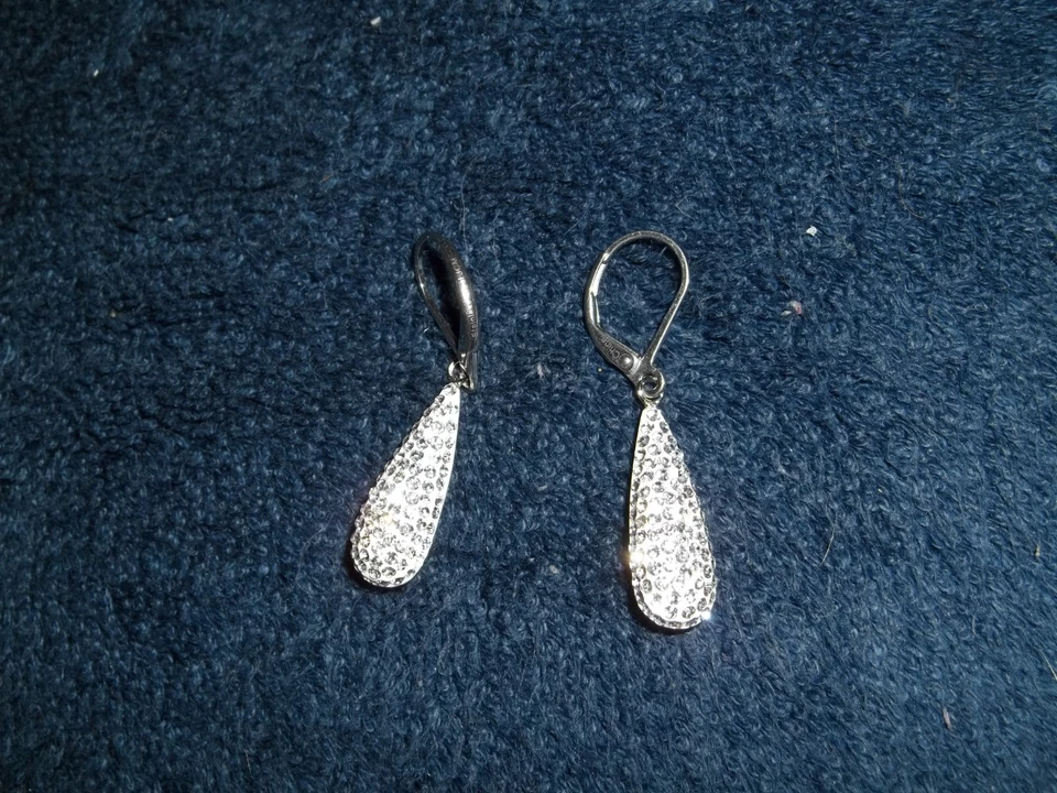 Pendientes colgantes de cristal de acero por diseño Foto 1 de 4