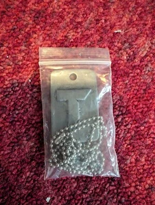 NIP TUROK DINOSAUR HUNTER PROMO DOG TAGS NECKLACE 1997 VIDEO GAME - Picture 1 of 2