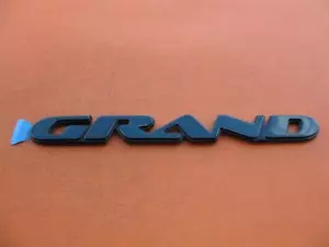 99 00 01 02 03 04 05 EMBLEMA LATERAL PONTIAC GRAND AM LOGOTIPO INSIGNIA SIGNO SÍMBOLO VERDE - Imagen 1 de 2