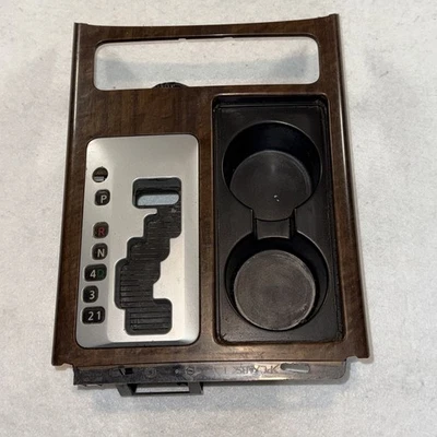 Nissan Titan 2008-2015 cambio central moldura bisel gris con portavasos Foto 1 de 4