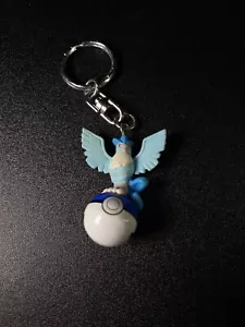 Vintage Pokémon Articuno Pokeball Keychain Bell Nintendo CGTSJ - Picture 1 of 3