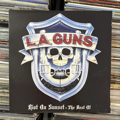 L.A. Guns Riot On Sunset The Best Of Ltd Edition BLUE Vinyl LP Record Album Foto 1 de 4