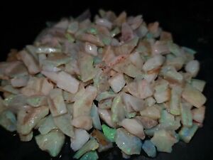 Australian Genuine Rough opal   one ounces Colour  Green chips small stones