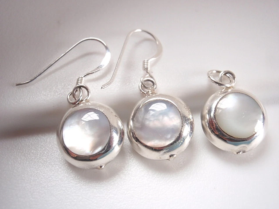 Juego de pendientes y colgantes reversibles de plata de ley 925 de ónix verde madreperla Foto 1 de 3