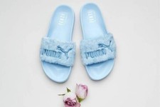 black furry puma slides