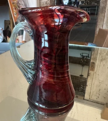 Hand blown Glass Ruby Red Pitcher Applied Ribbed Clear Glass Handle Bubbles Read - Image 1 of 4