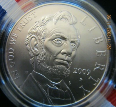 $ 2009 P United States Abraham Lincoln Commemorative Uncirculated Silver Dollar - Image 1 of 3