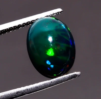 Натуральный черный эфиопский опал кабошон овальной формы драгоценный камень россыпью 1,5 карата 11X8X4 мм - Изображение 1 из 3