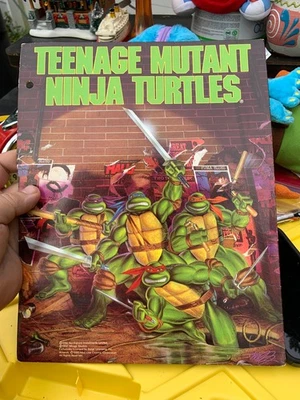 De colección 1990 Teenage Mutant Ninja Turtles - Nueva línea/Mirage/Carpeta Northshore Foto 1 de 4