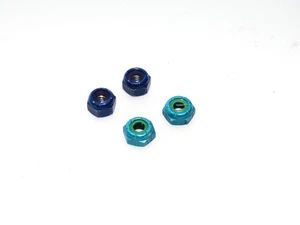 L22-4149 VINTAGE TEAM LOSI XXX-T 1:10 TRUCK ALUMINUM WHEEL NUTS - Picture 1 of 1