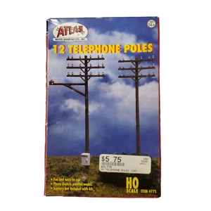 Atlas Modelleisenbahn 12 Telefonmasten Bausatz Diorama Spur HO #775 NEU - Bild 1 von 2