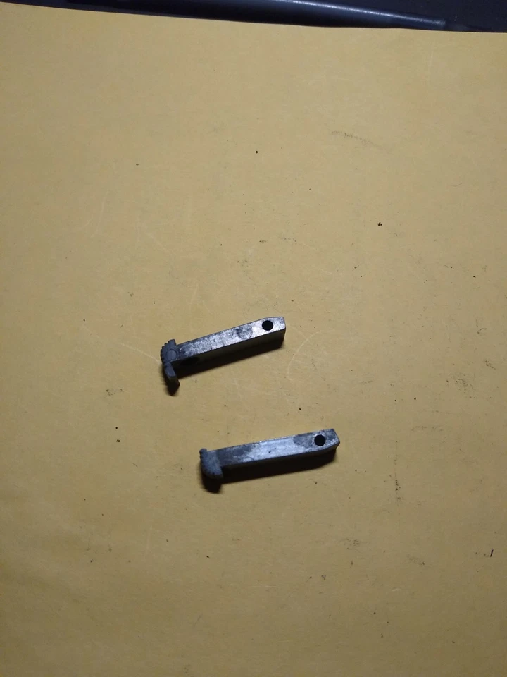 Jennings Firearms Bryco Arms 38 380 Auto Pistol Parts: Magazine Release  - Image 1 of 1