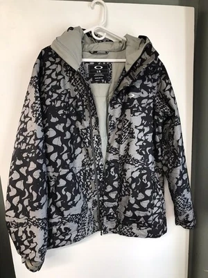 Chaqueta de esquí y snowboard Oakley para hombre L camuflaje abstracto para nieve Foto 1 de 4