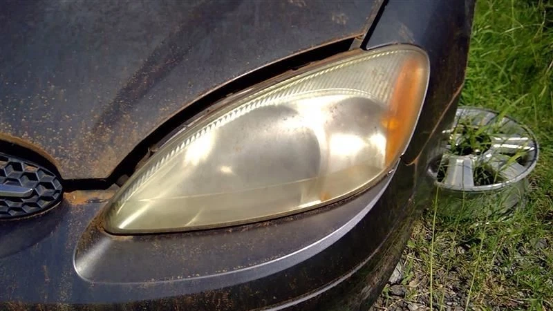 Faro izquierdo del conductor para Ford Taurus 00-07 OEM Foto 1 de 1