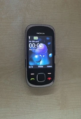 Nokia 7230 (RM-604) Schwarz, Volle Funktion, Geprüft, Händler, Gebraucht - Bild 1 von 2