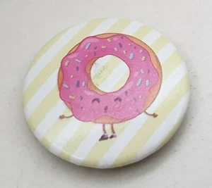 CARTOON PINK RING DOUGHNUT PIN BADGE BUTTON NOVELTY COLLECTABLE ANIMATION - Picture 1 of 2