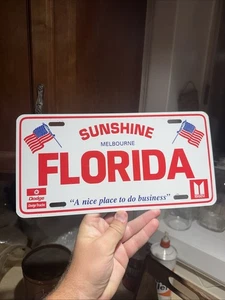 Vintage Sunshine Dodge License Plate Melbourne Florida License Dealer - Picture 1 of 4