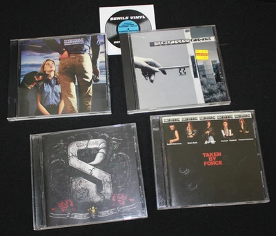 Lot of 4 Scorpions CDs  taken by force, crazy, animal magnetism, Sting in the... - Image 1 of 4