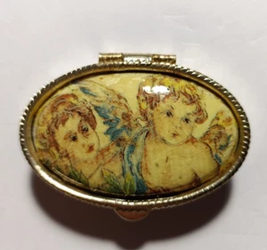 Antique old vintage collectible golden oval metal pill box little angels - Picture 1 of 8