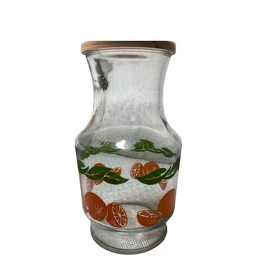 复古 Anchor Hocking 橙色果汁玻璃瓶 带塑料盖橙子和叶子设计 — 第 1/4 张图片