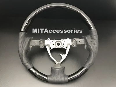 MIT Toyota FJ Cruiser 2006-2017 piano negro cuero genuino volante - DEPORTIVO Foto 1 de 4