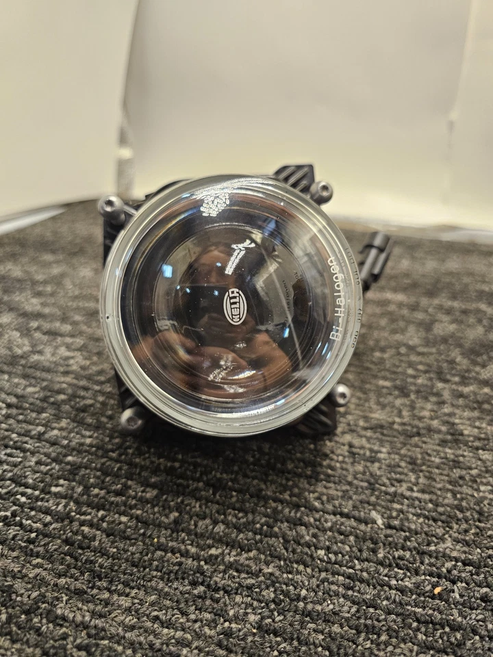 Conjunto de faros Hella 1AL 009 998 - 021 HLMP 90MM H9 12V 65W Foto 1 de 4