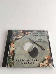 A Woman Sounds Ancient Wisdom Zen Meditative Mucus For Bamboo Music. - Picture 1 of 3