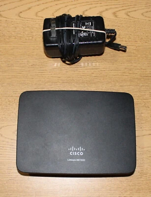 Cisco Linksys SE1500 5-Port Ethernet Switch & Power Adapter - Image 1 of 3