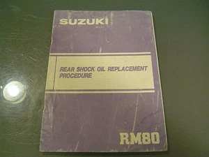 Folleto de procedimiento de reemplazo de aceite de choque trasero Suzuki RM80 (cuatro páginas) - Imagen 1 de 3