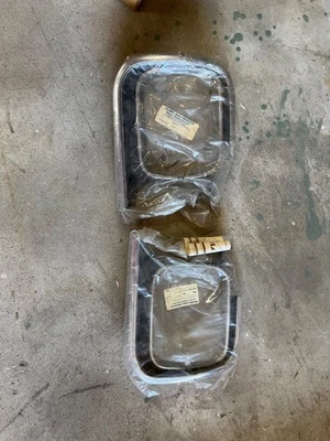 NOS 1978 AMC CONCORD HEADLAMP BEZELS - PAIR IN ORIGINAL PACKAGING! - Image 1 of 4