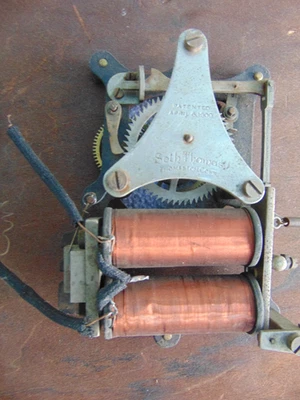 ANTIQUE ELECTRIC SETH THOMAS WALL CLOCK MOVEMENT AND DIAL WOODEN BACKBOARD HANDS - Image 1 of 4