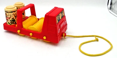 Rodillos rítmicos de camión de juguete Johnson & Johnson Red Pull 1982 de colección Foto 1 de 4