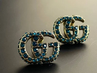 Vintage Gucci Blue Rhinestone Pave GG Logo Stud Earrings - Image 1 of 4