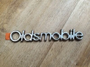 New Oldsmobile Emblem metal lettering is Chrome/Silver 5 1/2” long by 7/8” High - Picture 1 of 4