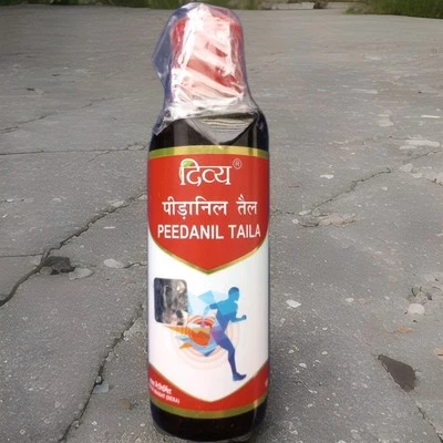 Divya Peedanil taila 100 ml (se envía en 3-5 días) Foto 1 de 2