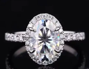 Anillo de compromiso de moissanita con halo ovalado D/VVS1 2,20 quilates | Chapado en oro blanco de 14 quilates 💎 - Imagen 1 de 3