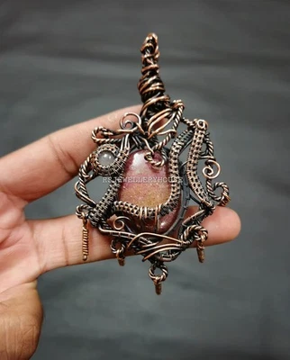 Colgante envuelto en alambre de cobre de rodonita arco iris piedra lunar colgante joyería Foto 1 de 4