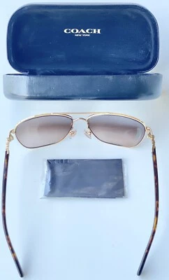 Gafas de sol Coach doradas/oscuras tortugas con lentes degradadas marrones HC7073B 930313 Foto 1 de 4