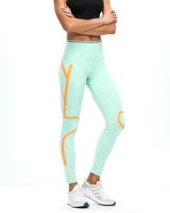 Adidas By Stella McCartney TRUEPACE Running Leggings. Color: Frozen Green/Orange - Imagen 1 de 24