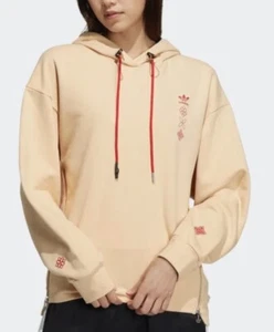 Adidas Damen Chinesisch Neujahr Hoodie mit Reißverschluss Größe X-Small - Farbe Halo Bernstein - Bild 1 von 11