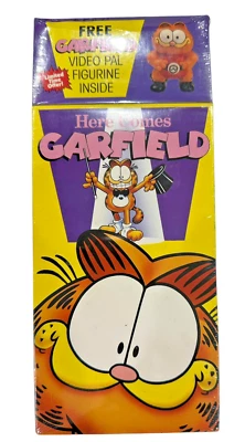 GARFIELD VHS Movie w FIGURINE Here Comes Garfield Rare 1990 Video Pal Toy SEALED — 第 1/4 张图片