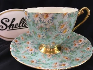 TAZA Y PLATILLO SHELLEY MARGUERITE CHINTZ FORMA RIPON #13694 BORDE DORADO - Imagen 1 de 6