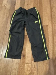 Nike Black Yellow Lined Windbreaker Track Pants Boys Size 4 - Picture 1 of 1